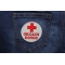 Orgasm Donor Medic Cross Patch Orgasm Donor Medic Cross Patch shown on jeans