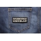 Overworked Underlaid Patch shown on jeans