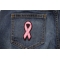 Small Pink Ribbon Breast Cancer Awareness Patch shown on jeans
