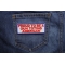 Proud To Be A Gun Toting American Patch In RWB Proud To Be A Gun Toting American Patch shown on jeans