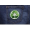 Recycle Patch Recycle Sign Novelty Iron on Patch shown on jeans