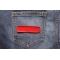 Red Name Tag Blank Patch shown on jeans