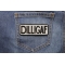 Reflective Small Dilligaf Patch | Embroidered Patches Reflective Dilligaf Patch shown on jeans