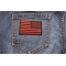 Reversed Red American Flag Patch shown on jeans