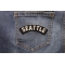 Seattle Patch shown on jeans