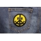 Smiley Face Peace Patch shown on jeans