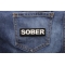 Sober Patch shown on jeans