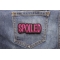 Spoiled Patch shown on jeans