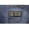 Stop Texting Start Driving Patch | Embroidered Patches Stop Texting Start Driving Patch shown on jeans