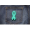 Teal PTSD Awareness Ribbon Patch Teal PTSD Awareness Ribbon Patch shown on jeans
