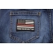 These Colors Don't Run Red Line US Flag Patch These Colors Don't Run Red Line US Flag Patch shown on jeans