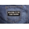 Welcome To The ShitShow Fun Patch | Embroidered Patches Welcome To The ShitShow Fun Funny Iron on Patch shown on jeans