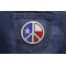 White Texas Peace Patch shown on jeans