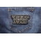 Winner Asshole Of The Year Award Patch shown on jeans
