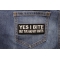 Yes I Bite But I've Had My Shots Funny Iron on Patch shown on jeans