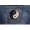 Ying Yang Novelty Iron on Patch shown on jeans