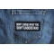 Don't Judge What You Don't Understand Patch shown on jeans