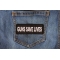 Guns Save Lives Patch shown on jeans