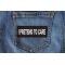 I Pretend to Care Funny Iron on Patch shown on jeans