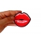 Kissing Lips Small Iron on Novelty Patch shown on hand for size comparison