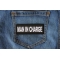 Man in Charge Funny Iron on Patch shown on jeans