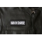 Man in Charge Patch - 4x1.5 inch - Embroidered Iron on Patch shown on leather vest