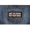 Save the Drama for Your Mama Funny Iron on Patch shown on jeans