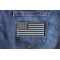 US Flag Patch Black And Gray 4 Inch US Flag Patch Black and Gray 4 Inch shown on jeans