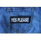 Yes Please Patch shown on jeans