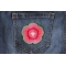 Pink and Green Flower Iron on Patch shown on jeans