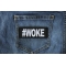 Hashtag Woke Patch shown on jeans