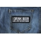 I Drink Beer Like a Fat Kid Eats Cake Funny Iron on Patch shown on jeans