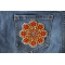 Kaleidoscope Flowers Patch shown on jeans