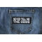 Never Tell me the Odds Patch shown on jeans