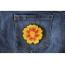 Orange Yellow Flower Patch Orange Yellow Flower Iron on Patch shown on jeans