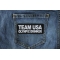 Team USA Olympic Drinker Funny Iron on Patch shown on jeans