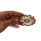 Yellow and Purple Flower Patch Yellow and Purple Flower Iron on Patch shown on hand for size comparison