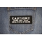 Caution Does Not Play Well With Others Funny Iron on Patch shown on jeans