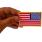 Reversed American Flag Patch shown on hand for size comparison