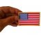 US Flag Patch Small Yellow Border 3 Inch shown on hand for size comparison