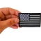 Black White and Reflective US Flag Patch shown on hand for size comparison