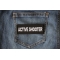 Active Shooter Patch shown on jeans