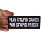 Play Stupid Games Win Stupid Prizes Funny Iron on Patch shown on hand for size comparison