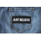Just Believe Iron on Morale Patch shown on jeans