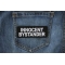 Innocent Bystander Funny Iron on Patch shown on jeans