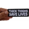 Thick Thighs Save Lives Patch, Funny Saying Patches shown on hand for size comparison