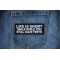 Life is Short Smile While You Still Have Teeth Patch shown on jeans