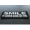 Smile It Looks Good on You Iron on Morale Patch diagonal view