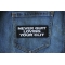 Never Quit Loving Your Clit Patch Never Quit Loving Your Clit Funny Iron on Patch shown on jeans