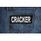 Cracker Patch Cracker Funny Iron on Patch shown on jeans